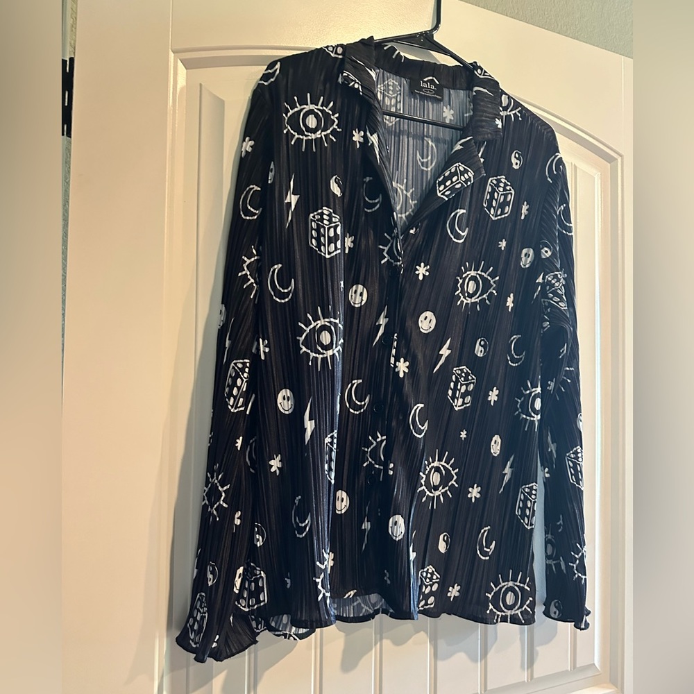 Dressed in Lala plisse top. Long sleeve. TOP ONLY